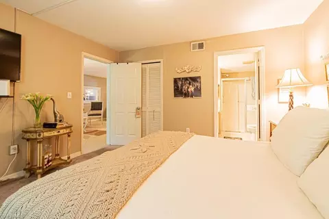 Bedroom - 130 Cypress Way E #1, Naples, FL 34110 photo 7 of 11