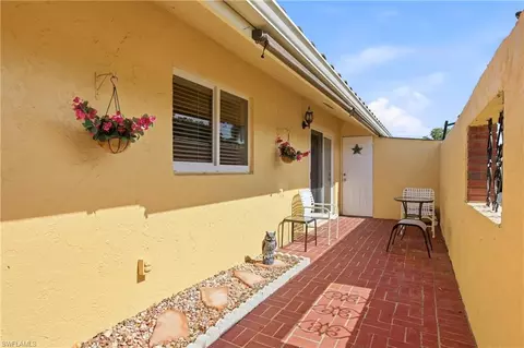 Exterior - 180 Harrison Rd #3, Naples, FL 34112 photo 7 of 11