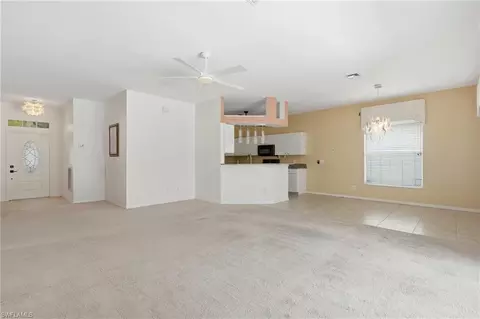 Living - 295 Stanhope Cir, Naples, FL 34104 photo 2 of 6