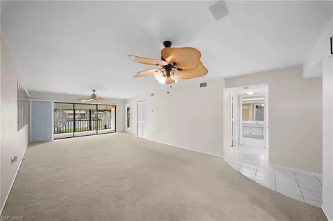 Living - 195 Cypress Way E #8, Naples, FL 34110 photo 2 of 7