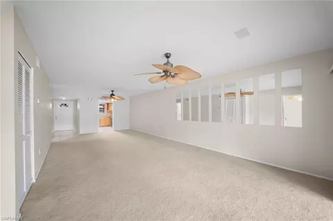 Living - 195 Cypress Way E #8, Naples, FL 34110 photo 5 of 7
