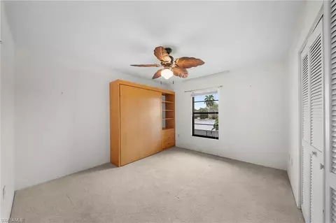 Bedroom - 195 Cypress Way E #8, Naples, FL 34110 photo 3 of 5