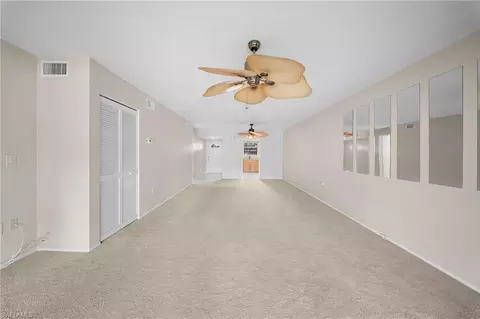 Living - 195 Cypress Way E #8, Naples, FL 34110 photo 6 of 7