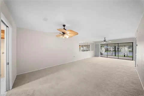 Living - 195 Cypress Way E #8, Naples, FL 34110 photo 3 of 7