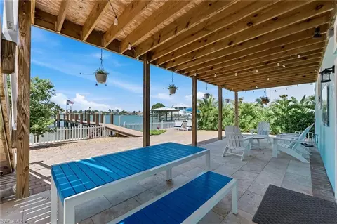 Exterior - 23 W Pelican St, Naples, FL 34113 photo 5 of 11
