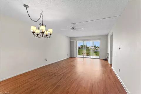 Living - 21 High Point Cir E #305, Naples, FL 34103 photo 1 of 4