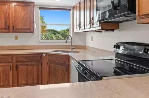 Kitchen - 21 High Point Cir E #305, Naples, FL 34103 photo 1 of 3
