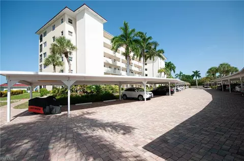 Exterior - 21 High Point Cir E #305, Naples, FL 34103 photo 1 of 16