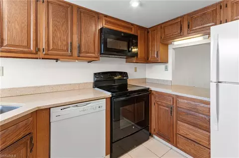 Kitchen - 21 High Point Cir E #305, Naples, FL 34103 photo 3 of 3