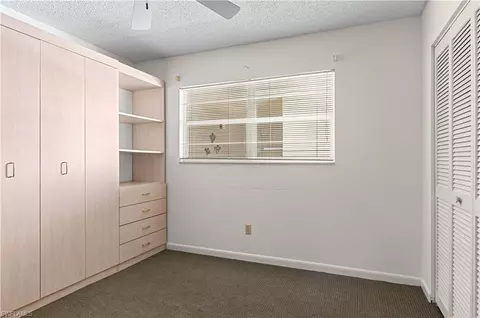 Bedroom - 21 High Point Cir E #305, Naples, FL 34103 photo 2 of 2