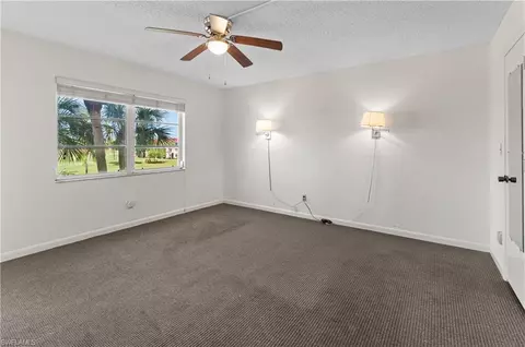 Bedroom - 21 High Point Cir E #305, Naples, FL 34103 photo 1 of 2
