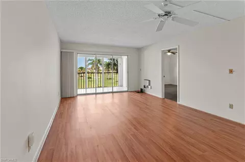 Living - 21 High Point Cir E #305, Naples, FL 34103 photo 2 of 4