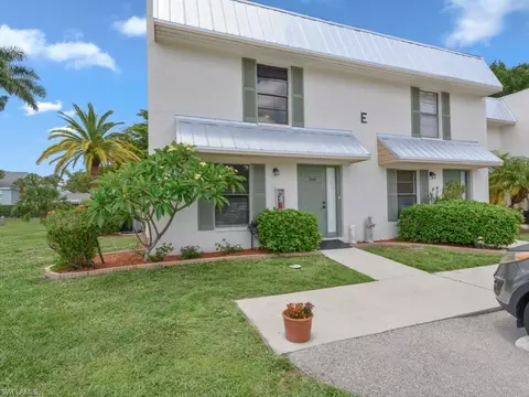 151 Cypress Way E #E101, Naples, FL 34110 photo 1