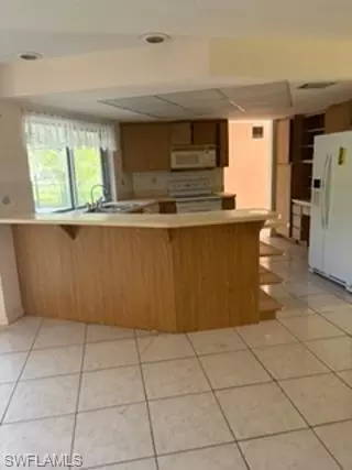 Kitchen - 224 Pine Valley Cir, Naples, FL 34113 photo 3 of 3