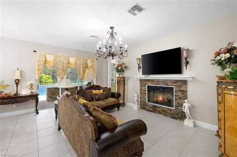Living - 3675 Canopy Cir, Naples, FL 34120 photo 2 of 2