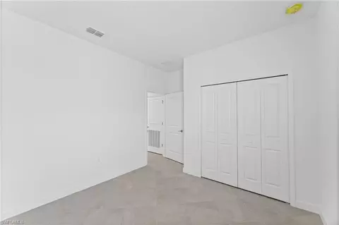 Bedroom - 1611 Double Eagle Trl, Naples, FL 34120 photo 6 of 6
