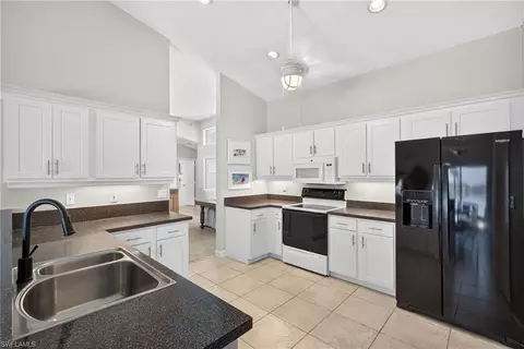 Kitchen - 7375 Mill Pond Cir, Naples, FL 34109 photo 2 of 4