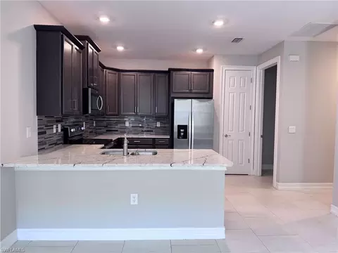 Kitchen - 1069 Tranquil Brook Dr, Naples, FL 34114 photo 1 of 2
