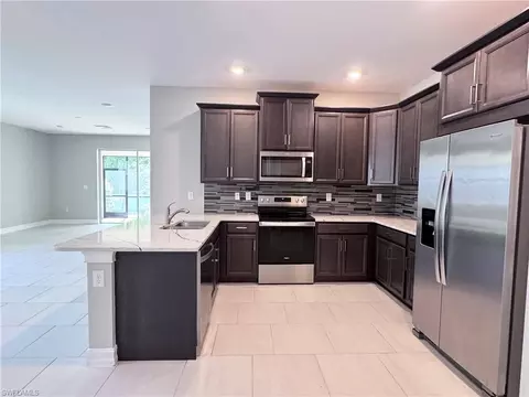 Kitchen - 1069 Tranquil Brook Dr, Naples, FL 34114 photo 2 of 2