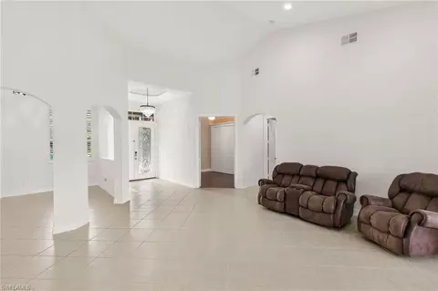 Living - 3917 Fabienne Ct, Naples, FL 34109 photo 3 of 6