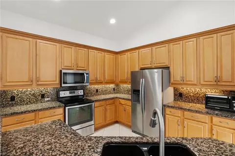 Kitchen - 3917 Fabienne Ct, Naples, FL 34109 photo 2 of 5