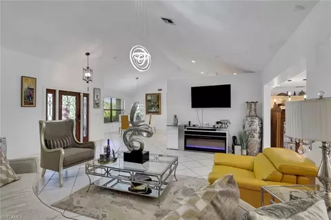 Living - 3036 Round Table Ln, Naples, FL 34112 photo 2 of 2