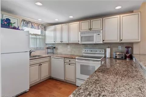Kitchen - 29 High Point Cir E #503, Naples, FL 34103 photo 2 of 3