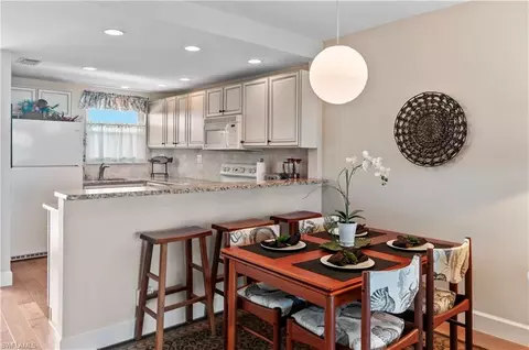 Dining - 29 High Point Cir E #503, Naples, FL 34103 photo 1 of 4