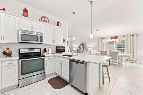Kitchen - 8667 Genova Ct, Naples, FL 34114 photo 4 of 4