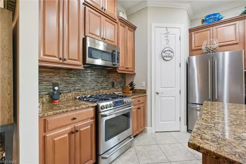 Kitchen - 23729 Pebble Pointe Ln, Bonita Springs, FL 34135 photo 4 of 7