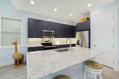 Kitchen - 7139 Cayo Coco Ln, Naples, FL 34113 photo 2 of 5