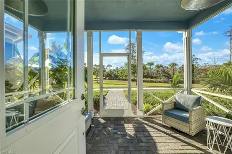 Exterior - 7139 Cayo Coco Ln, Naples, FL 34113 photo 2 of 11