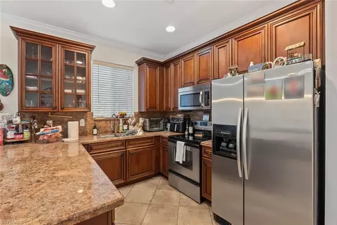 Kitchen - 10230 Tin Maple Dr #141, Estero, FL 33928 photo 3 of 4