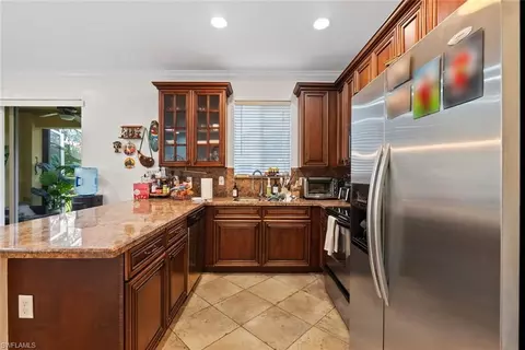 Kitchen - 10230 Tin Maple Dr #141, Estero, FL 33928 photo 4 of 4