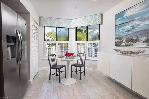 Dining - 508 Courtside Dr #E203, Naples, FL 34105 photo 3 of 3