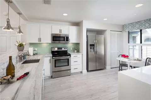Kitchen - 508 Courtside Dr #E203, Naples, FL 34105 photo 2 of 3