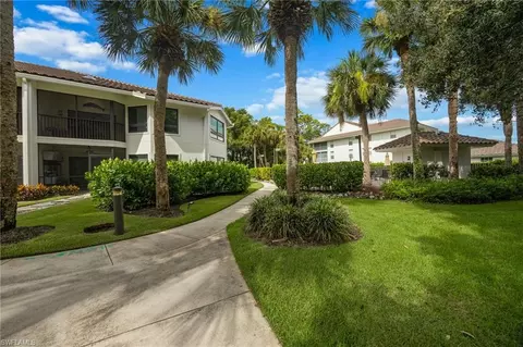 Exterior - 792 Eagle Creek Dr #203, Naples, FL 34113 photo 1 of 11
