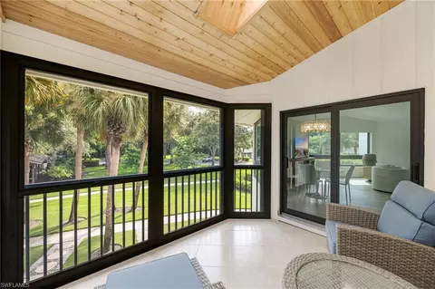Exterior - 792 Eagle Creek Dr #203, Naples, FL 34113 photo 4 of 11