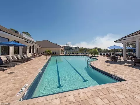 Exterior - 792 Eagle Creek Dr #203, Naples, FL 34113 photo 10 of 11