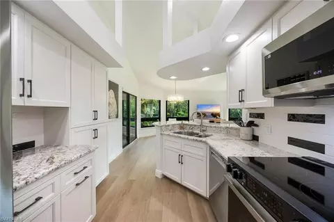 Kitchen - 792 Eagle Creek Dr #203, Naples, FL 34113 photo 3 of 4