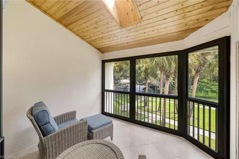 Exterior - 792 Eagle Creek Dr #203, Naples, FL 34113 photo 5 of 11