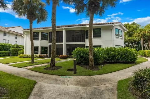 Exterior - 792 Eagle Creek Dr #203, Naples, FL 34113 photo 2 of 11