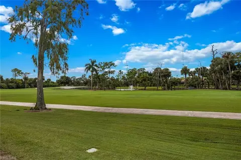 Exterior - 792 Eagle Creek Dr #203, Naples, FL 34113 photo 6 of 11