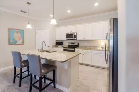 Kitchen - 17332 Ashcomb Way, Estero, FL 33928 photo 3 of 4