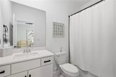 Bath - 18566 Ives Dr, Estero, FL 33928 photo 3 of 4