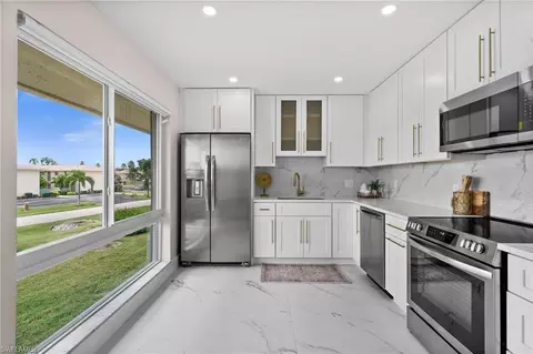 Kitchen - 105 Harrison Rd #4, Naples, FL 34112 photo 3 of 3