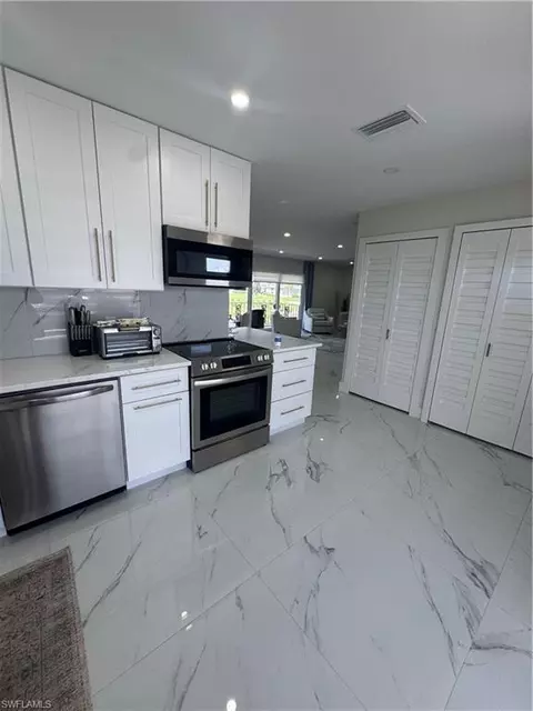 Kitchen - 105 Harrison Rd #4, Naples, FL 34112 photo 4 of 4