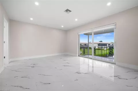 Living - 105 Harrison Rd #4, Naples, FL 34112 photo 1 of 4