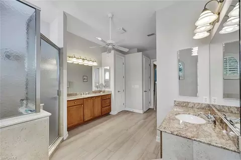 Bath - 16075 Parque Ln, Naples, FL 34110 photo 2 of 4