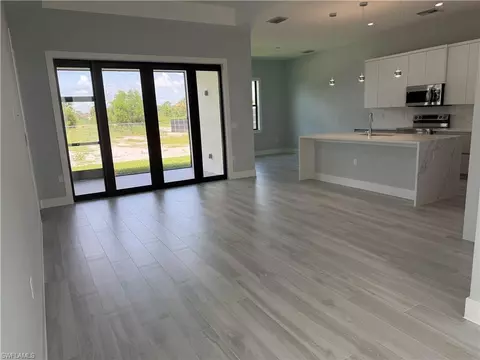 Living - 3237 29th Ave NE, Naples, FL 34120 photo 2 of 3